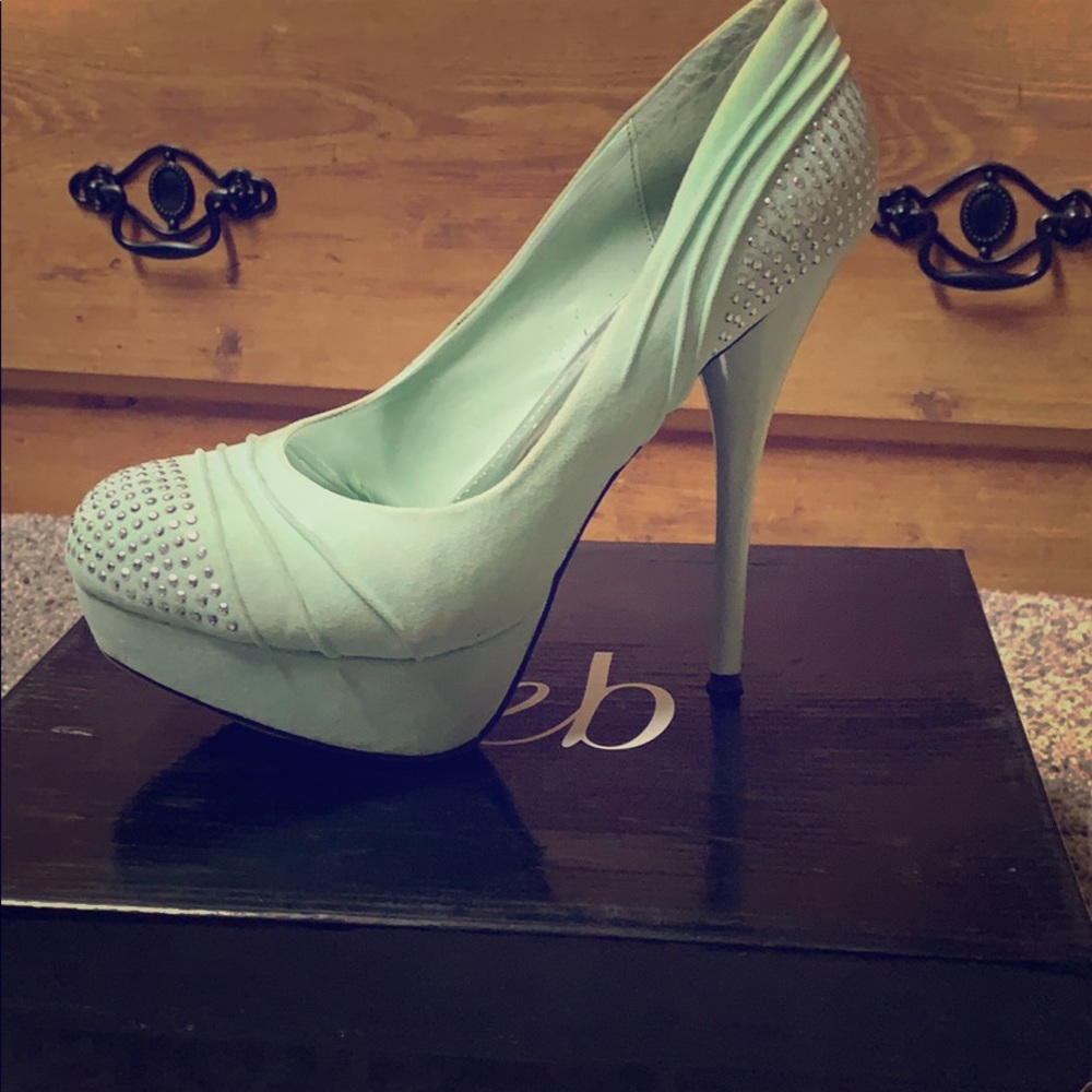 Mint green high heels.